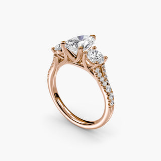 Three stone split shank pavé engagement ring setting with pear-shaped center from LabGrownDiamonds.com, shown from four angles.