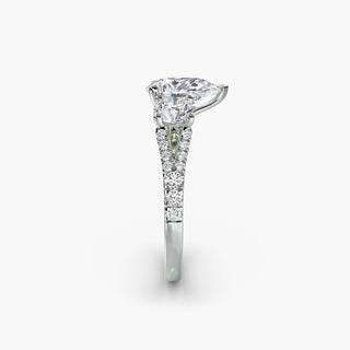 Three stone split shank pavé engagement ring setting with pear-shaped center stone in white gold from LabGrownDiamonds.com
