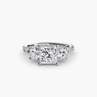 Three stone split shank pavé engagement ring setting with princess cut center from LabGrownDiamonds.com, shown from top view.