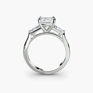 Three stone engagement ring setting in white gold, side profile view with an asscher-cut lab grown center diamond and tapered baguette side stones. || #metal_white gold|platinum #diamond shape_asscher