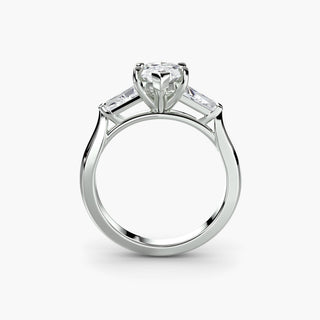 Three stone engagement ring setting in white gold, side profile view with a marquise-cut lab grown center diamond and tapered baguette side stones. || #metal_white gold|platinum #diamond shape_marquise