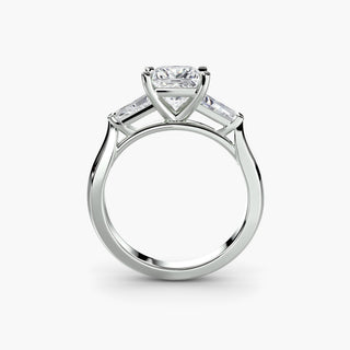 Three stone engagement ring setting in white gold, side profile view with a princess-cut lab grown center diamond and tapered baguette side stones. || #metal_white gold|platinum #diamond shape_princess