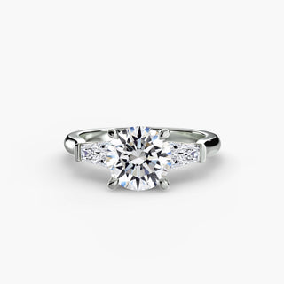 Three stone tapered baguette engagement ring setting in white gold with round center stone, crafted by LabGrownDiamonds.com