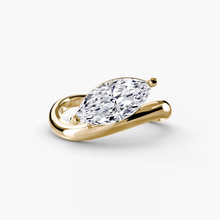 Curved lab grown diamond ring in yellow gold, featuring a horizontally set marquise lab grown diamond on a sculptural wave band. || #metal_yellow gold