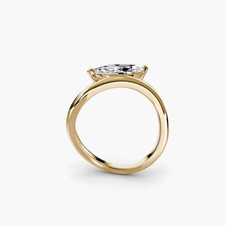 Curved lab grown diamond ring in yellow gold, side profile view showing the sculptural wave band with a marquise lab grown diamond. || #metal_yellow gold
