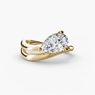 Wave lab grown diamond ring in yellow gold, featuring a tilted pear-shaped lab grown diamond on a flowing wave band. || #metal_yellow gold