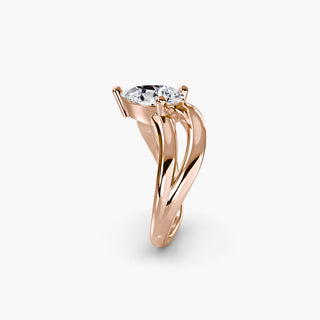 Double wave lab grown diamond ring in rose gold showing the sculptural double wave band profile with a pear-shaped lab grown diamond. || #metal_rose gold