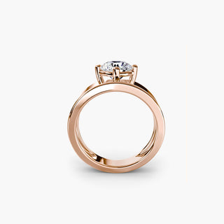 Solitaire engagement ring setting in rose gold, side profile view showing the wide band with a round lab grown diamond. || #metal_rose gold #diamond shape_round