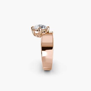 Solitaire engagement ring setting in rose gold showing the wide band profile with a round lab grown diamond. || #metal_rose gold #diamond shape_round