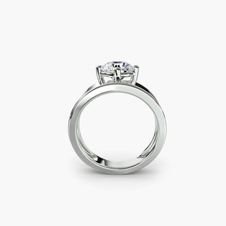 Solitaire engagement ring setting in white gold, side profile view showing the wide band with a round lab grown diamond. || #metal_white gold|platinum #diamond shape_round
