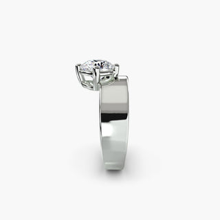 Solitaire engagement ring setting in white gold showing the wide band profile with a round lab grown diamond. || #metal_white gold|platinum #diamond shape_round