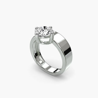 Solitaire engagement ring setting in white gold with a round lab grown diamond on a wide band, three-quarter view. || #metal_white gold|platinum #diamond shape_round