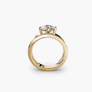Solitaire engagement ring setting in yellow gold, side profile view showing the wide band with a round lab grown diamond. || #metal_yellow gold #diamond shape_round