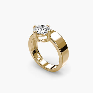 Solitaire engagement ring setting in yellow gold with a round lab grown diamond on a wide band, three-quarter view. || #metal_yellow gold #diamond shape_round