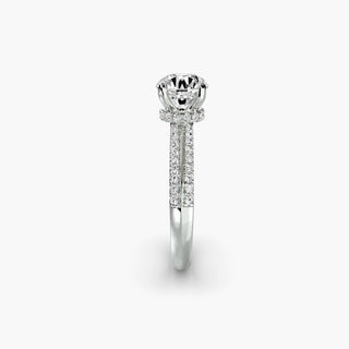 LabGrownDiamonds.com knife-edge pavé engagement ring with round center stone and hidden halo, showcasing intricate metalwork and sparkling accents.