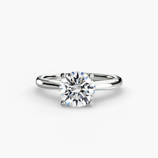Solitaire engagement ring setting with a round lab grown diamond and a tapered white gold band. || #metal_white gold|platinum #diamond shape_round