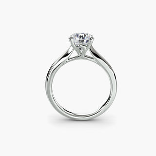 Solitaire engagement ring setting in white gold, side profile view showing the cathedral shoulders and loop-style basket. || #metal_white gold|platinum #diamond shape_round