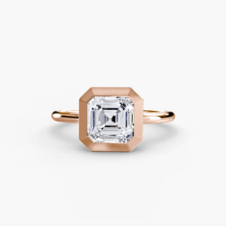 Bezel solitaire engagement ring setting in rose gold, featuring an asscher-cut lab grown diamond in a smooth sculpted bezel. || #metal_rose gold #diamond shape_asscher