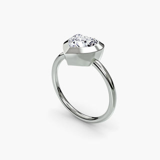 Bezel solitaire engagement ring setting in white gold with a heart-shaped lab grown diamond, three-quarter view. || #metal_white gold|platinum #diamond shape_heart