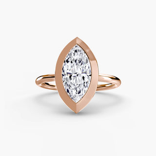 Bezel solitaire engagement ring setting in rose gold, featuring a marquise-cut lab grown diamond in a smooth sculpted bezel. || #metal_rose gold #diamond shape_marquise