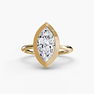 Bezel solitaire engagement ring setting in yellow gold, featuring a marquise-cut lab grown diamond in a smooth sculpted bezel. || #metal_yellow gold #diamond shape_marquise