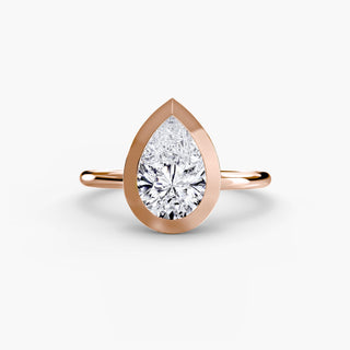 Bezel solitaire engagement ring setting in rose gold, featuring a pear-shaped lab grown diamond in a smooth sculpted bezel. || #metal_rose gold #diamond shape_pear