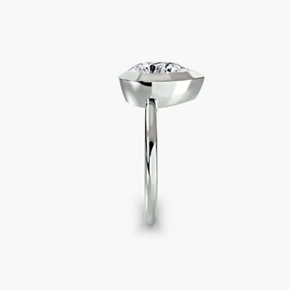 Bezel solitaire engagement ring setting in white gold showing the band profile, with a pear-shaped lab grown diamond. || #metal_white gold|platinum #diamond shape_pear