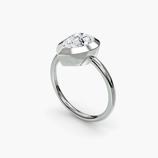 Bezel solitaire engagement ring setting in white gold with a pear-shaped lab grown diamond, three-quarter view. || #metal_white gold|platinum #diamond shape_pear