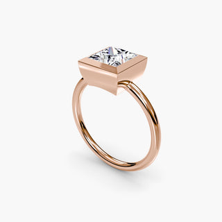 Bezel solitaire engagement ring setting in rose gold with a princess-cut lab grown diamond, three-quarter view. || #metal_rose gold #diamond shape_princess
