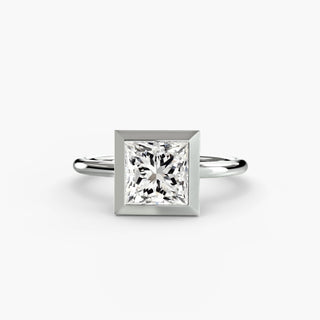 Bezel solitaire engagement ring setting in white gold, featuring a princess-cut lab grown diamond in a smooth sculpted bezel. || #metal_white gold|platinum #diamond shape_princess