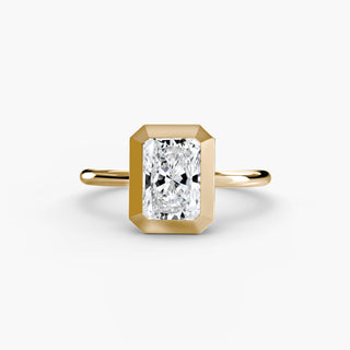 Bezel solitaire engagement ring setting in yellow gold, featuring a radiant-cut lab grown diamond in a smooth sculpted bezel. || #metal_yellow gold #diamond shape_radiant