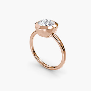 Bezel solitaire engagement ring setting in rose gold with a round lab grown diamond, three-quarter view. || #metal_rose gold #diamond shape_round