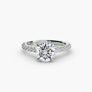 LabGrownDiamonds.com hidden halo pavé cathedral engagement ring setting with round diamonds, white gold finish, viewed from bottom angle.
