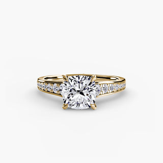 Reverse tapered channel set engagement ring with cushion-cut center stone, featuring a sleek, modern design in gold.