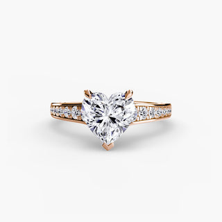 Reverse tapered channel set engagement ring with heart-shaped diamonds, featuring a sleek, modern gold band.