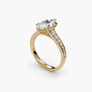 Reverse tapered channel set engagement ring with marquise-shaped diamonds, featuring a sleek gold band, by LabGrownDiamonds.com.