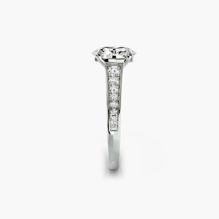 Reverse tapered channel set engagement ring with oval lab-grown diamonds, featuring a white gold band and side view design.