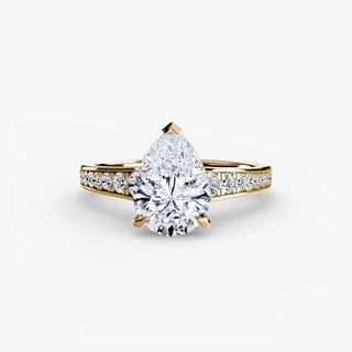 Reverse tapered channel set engagement ring with pear-shaped yellow gold accents, featuring lab-grown diamonds in a sleek setting.