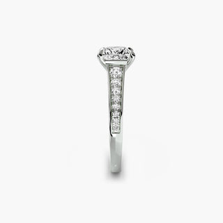 Reverse tapered channel set engagement ring with princess cut diamonds in white gold, showcasing side view and intricate setting details.