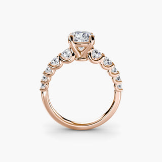 Graduated round U-prong diamond band engagement ring with cushion-shaped diamonds in a setting from LabGrownDiamonds.com
