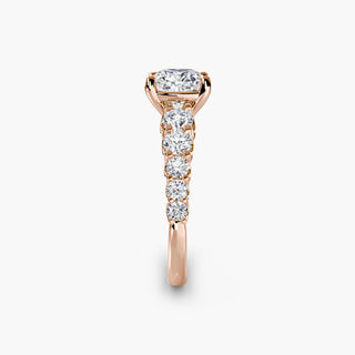 LabGrownDiamonds.com graduated round U-prong diamond band engagement ring with cushion-shaped diamonds, side view.