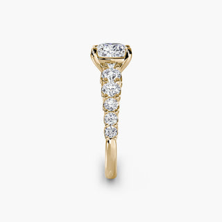 LabGrownDiamonds.com graduated round U-prong diamond band engagement ring with cushion-shaped diamonds, side view.