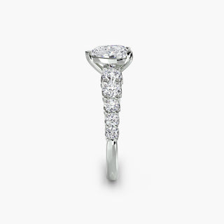 Graduated round U-prong diamond band engagement ring with heart-shaped accents in white gold, featuring lab-grown diamonds.