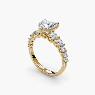 LabGrownDiamonds.com graduated round U-prong diamond band engagement ring with heart-shaped design, viewed from four angles.