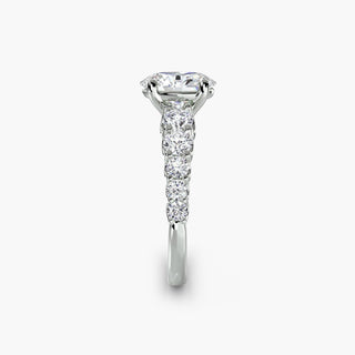 LabGrownDiamonds.com oval-shaped graduated round U-prong diamond band engagement ring with side view detailing the setting.