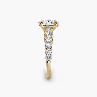 Gold graduated round U-prong diamond band engagement ring setting with oval diamonds, crafted by LabGrownDiamonds.com.
