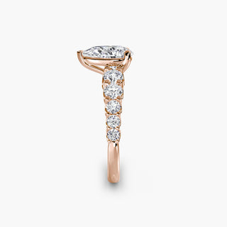 LabGrownDiamonds.com diamond engagement ring with a graduated round U-prong setting, featuring a band with side view of the design.