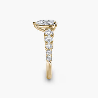 Graduated round U-prong diamond band engagement ring with side view, featuring lab-grown diamonds and a polished gold setting.