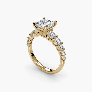 Graduated round U-prong diamond band engagement ring with multiple diamond settings, featuring a sleek silver finish.