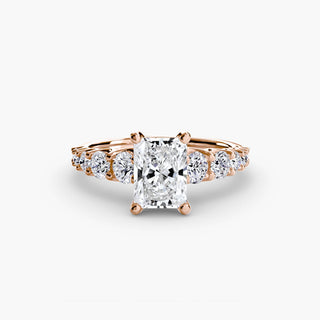 Graduated round U-prong diamond band engagement ring setting with radiant cut diamonds, crafted by LabGrownDiamonds.com.